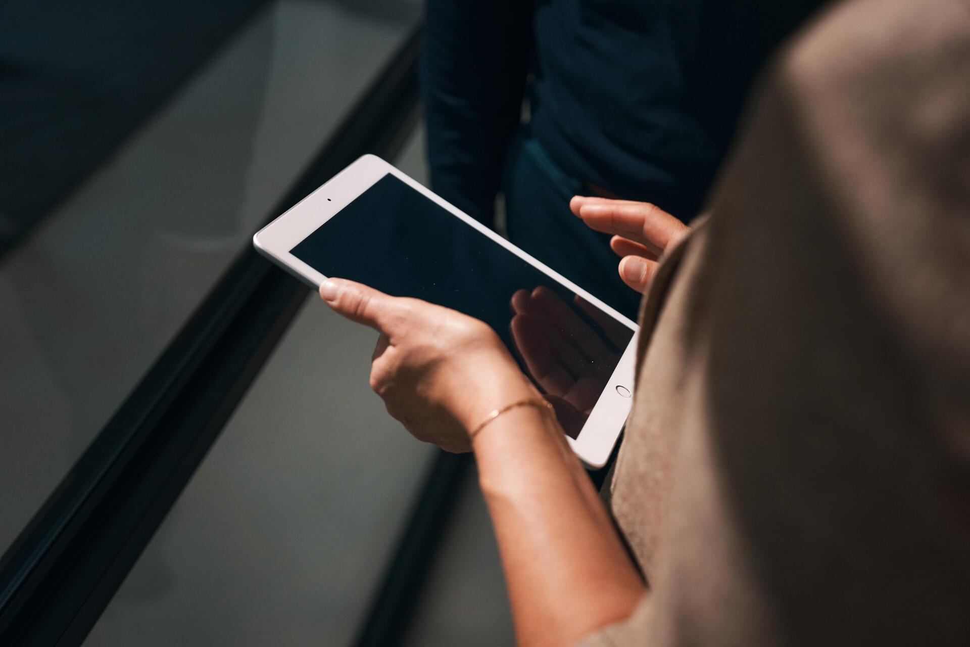 iPad in the hand